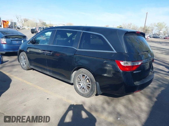 2012 Honda Odyssey EX-L with VIN 5FNRL5H68CB025481, listed as a IAAI auction lot 41979121 with Not Provided miles and . Bid and sale history available at DreamBid. Image 3.