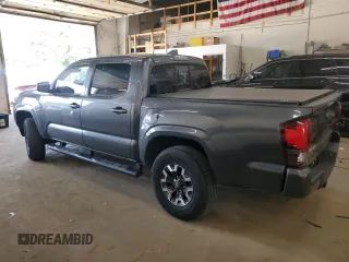2021 Toyota Tacoma SR with VIN 3TMCZ5AN5MM378375, listed as a Copart auction lot 63806325 with 47,061 mi miles and Salvage title. Bid and sale history available at DreamBid. Image 2.