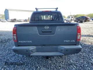 2016 Nissan Frontier Pro-4X with VIN 1N6AD0EVXGN702673, listed as a Copart auction lot 54716865 with 81,258 mi miles and Salvage title. Bid and sale history available at DreamBid. Image 6.