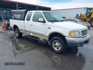 1999 Ford F-150 XL with VIN 1FTRX18LXXNA16159, listed as a IAAI auction lot 41746440 with 999,999 mi miles. Bid and sale history available at carsss.com. Image 1.