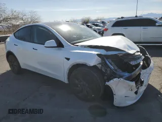 2025 Tesla Model Y Long Range with VIN 7SAYGDED2SA373756, listed as a Copart auction lot 49866835 with 3,318 mi miles and Salvage Title. Bid and sale history available at DreamBid. Image 4.