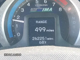 2010 Honda Insight LX with VIN JHMZE2H52AS032697, listed as a IAAI auction lot 42255794 with 262,251 mi miles and . Bid and sale history available at DreamBid. Image 15.