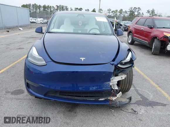 2023 Tesla Model Y Long Range with VIN 7SAYGDEE7PA194998, listed as a IAAI auction lot 41787170 with 16,221 mi miles and . Bid and sale history available at DreamBid. Image 12.