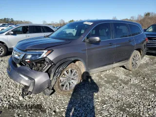 2021 Honda Pilot EX-L with VIN 5FNYF5H57MB027475, listed as a Copart auction lot 42239455 with 66,713 mi miles and Salvage Title. Bid and sale history available at carsss.com. Image 1.