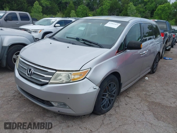2011 Honda Odyssey Touring with VIN 5FNRL5H93BB071518, listed as a IAAI auction lot 42402421 with 227,647 mi miles and . Bid and sale history available at DreamBid. Image 17.