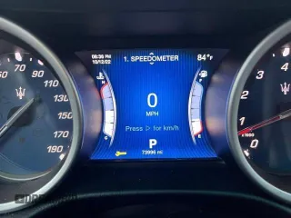 2015 Maserati Ghibli z VIN ZAM57XSA2F1159438, wystawiony jako Copart lot #49187735 z przebiegiem 73 996 mil mil oraz Szkoda całkowita • Salvage title. Historia ofert i sprzedaży dostępna na DreamBid. Obrazek 7.