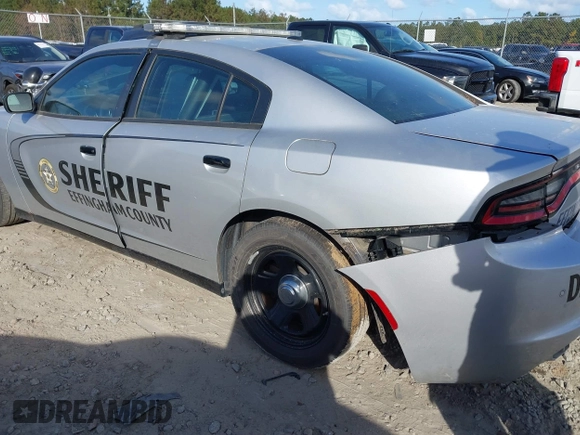 2021 Dodge Charger Police with VIN 2C3CDXAT8MH643477, listed as a IAAI auction lot 40688118 with 59,555 mi miles and . Bid and sale history available at DreamBid. Image 3.