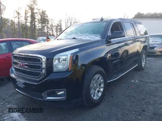 2020 GMC Yukon XL SLT with VIN 1GKS1GKC1LR286726, listed as a IAAI auction lot 41294319 with 152,166 mi miles. Bid and sale history available at carsss.com. Image 2.