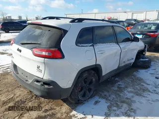 2015 Jeep Cherokee North with VIN 1C4PJMCS7FW792850, listed as a IAAI auction lot 41323432 with 102,642 mi miles. Bid and sale history available at carsss.com. Image 4.