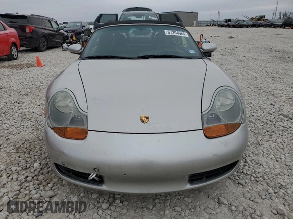 2001 Porsche Boxster с VIN WP0CA29821U621779, выставлен на аукционе Copart как лот 87204984 с пробегом 82 091 миль миль и Списание • Salvage title. История ставок и продаж доступна на DreamBid. Изображение 5.