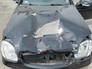 2002 Mercedes-Benz SLK 320 with VIN WDBKK65FX2F237273, listed as a Copart auction lot 61068345 with 193,304 mi miles and Salvage title. Bid and sale history available at DreamBid. Image 11.