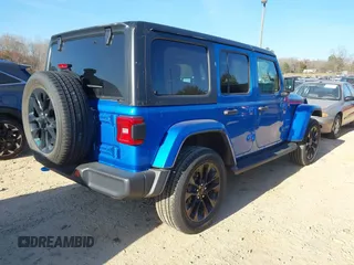 2022 Jeep Wrangler Unlimited Sahara z VIN 1C4JJXP64NW192452, wystawiony jako IAAI lot #41631295 z przebiegiem 23 738 mil mil oraz . Historia ofert i sprzedaży dostępna na DreamBid. Obrazek 4.
