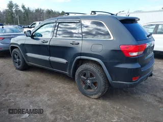 2011 Jeep Grand Cherokee Laredo with VIN 1J4RR4GG5BC670369, listed as a IAAI auction lot 41892892 with 164,807 mi miles and . Bid and sale history available at DreamBid. Image 3.