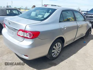 2011 Toyota Corolla L with VIN 2T1BU4EE1BC572731, listed as a IAAI auction lot 42024851 with 153,923 mi miles. Bid and sale history available at carsss.com. Image 4.