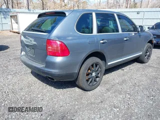 2004 Porsche Cayenne S with VIN WP1AB29P74LA71547, listed as a IAAI auction lot 41751311 with 191,264 mi miles. Bid and sale history available at carsss.com. Image 4.