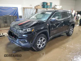 2022 Jeep Compass Trailhawk with VIN 3C4NJDDB5NT148368, listed as a Copart auction lot 48808755 with 62,060 mi miles and Salvage title. Bid and sale history available at DreamBid. Image 1.