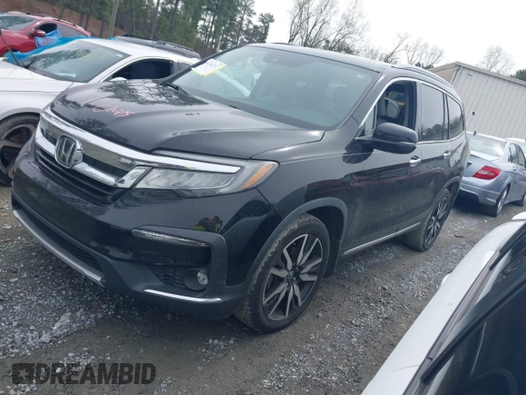 2019 Honda Pilot Touring 7-Passenger z VIN 5FNYF5H66KB027960, wystawiony jako IAAI lot #41863212 z przebiegiem 114 615 mil mil oraz . Historia ofert i sprzedaży dostępna na DreamBid. Obrazek 17.