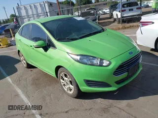 2015 Ford Fiesta SE z VIN 3FADP4BJ6FM205425, wystawiony jako IAAI lot #42075564 z przebiegiem 141 794 mil mil oraz . Historia ofert i sprzedaży dostępna na DreamBid. Obrazek 1.