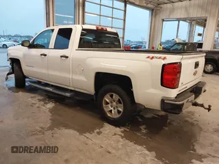 2014 Chevrolet Silverado 1500 LT with VIN 1GCVKREC3EZ106310, listed as a IAAI auction lot 40752259 with 162,397 mi miles and . Bid and sale history available at DreamBid. Image 3.