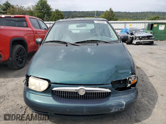 1999 Mercury Villager z VIN 4M2XV11T1XDJ23740, wystawiony jako Copart lot #71845964 z przebiegiem 137 758 mil mil oraz Szkody całkowita. Historia ofert i sprzedaży dostępna na DreamBid. Obrazek 5.