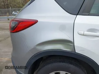 2013 Mazda CX-5 Touring with VIN JM3KE2CE0D0105115, listed as a IAAI auction lot 41899956 with 301,264 mi miles. Bid and sale history available at carsss.com. Image 6.