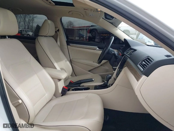 2018 Volkswagen Passat 2.0T SE with VIN 1VWBA7A35JC018885, listed as a IAAI auction lot 41955324 with 107,046 mi miles. Bid and sale history available at carsss.com. Image 5.