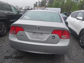 2006 Honda Civic LX with VIN 2HGFA16556H520894, listed as a IAAI auction lot 41963736 with 166,682 mi miles and . Bid and sale history available at DreamBid. Image 16.
