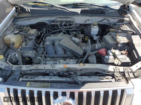 2008 Mercury Mariner with VIN 4M2CU81158KJ13802, listed as a Copart auction lot 57981485 with 109,225 mi miles and Salvage title. Bid and sale history available at DreamBid. Image 11.