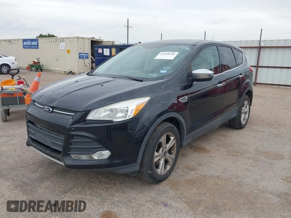 2015 Ford Escape SE with VIN 1FMCU9G90FUA54163, listed as a IAAI auction lot 42058788 with 130,623 mi miles. Bid and sale history available at carsss.com. Image 2.