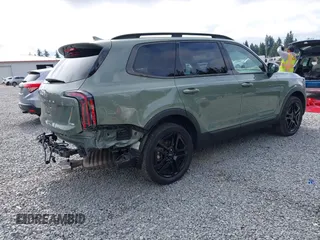 2024 Kia Telluride EX X-Line with VIN 5XYP3DGC6RG488665, listed as a IAAI auction lot 42585925 with 28,906 mi miles and . Bid and sale history available at DreamBid. Image 4.