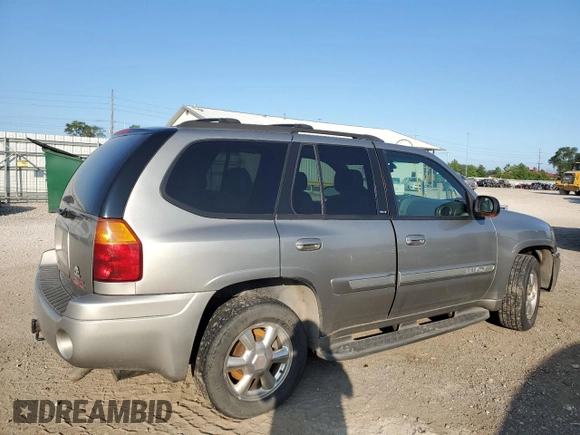 2002 GMC Envoy SLT with VIN 1GKDT13S322420861, listed as a Copart auction lot 63408164 with 250,167 mi miles and Salvage Title. Bid and sale history available at DreamBid. Image 3.