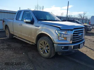 2015 Ford F-150 XLT with VIN 1FTFX1EF4FKE71784, listed as a IAAI auction lot 41666937 with 112,117 mi miles. Bid and sale history available at carsss.com. Image 1.