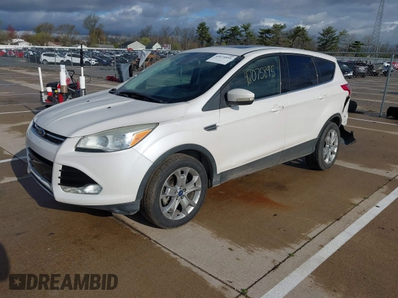 2013 Ford Escape SEL with VIN 1FMCU9H94DUB29989, listed as a IAAI auction lot 42075895 with 147,242 mi miles and . Bid and sale history available at DreamBid. Image 2.