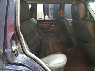 1995 Jeep Cherokee z VIN 1J4FN78S7SL537213, wystawiony jako Copart lot #58700105 z przebiegiem 261 606 mil mil oraz Szkoda całkowita • Salvage title. Historia ofert i sprzedaży dostępna na DreamBid. Obrazek 10.