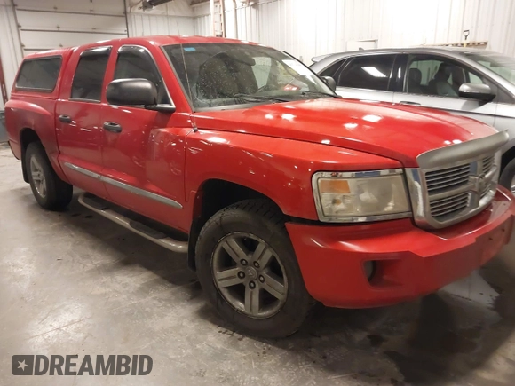 2008 Dodge Dakota Laramie z VIN 1D7HW58N58S534499, wystawiony jako IAAI lot #41528141 z przebiegiem 127 340 mil mil oraz . Historia ofert i sprzedaży dostępna na DreamBid. Obrazek 1.