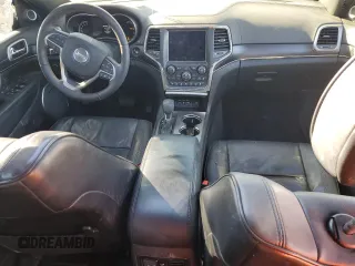 2018 Jeep Grand Cherokee High Altitude with VIN 1C4RJECG1JC125602, listed as a Copart auction lot 88702275 with 59,701 mi miles and Salvage title. Bid and sale history available at DreamBid. Image 8.