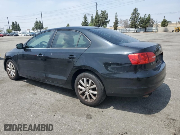 2013 Volkswagen Jetta SE with VIN 3VWDX7AJ6DM438180, listed as a Copart auction lot 59582655 with 106,082 mi miles and Salvage title. Bid and sale history available at DreamBid. Image 2.