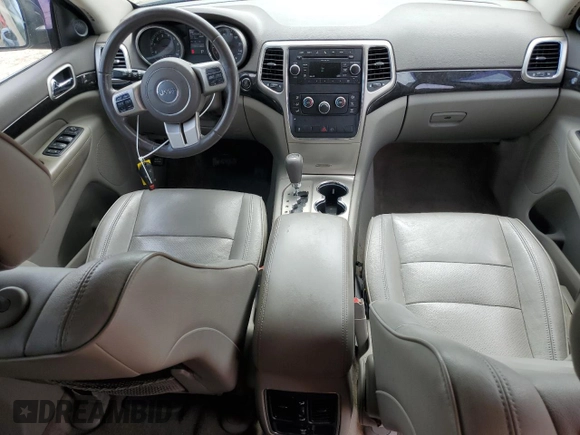 2011 Jeep Grand Cherokee Laredo with VIN 1J4RS4GG4BC537459, listed as a Copart auction lot 50920965 with 112,810 mi miles and Salvage Title. Bid and sale history available at DreamBid. Image 8.