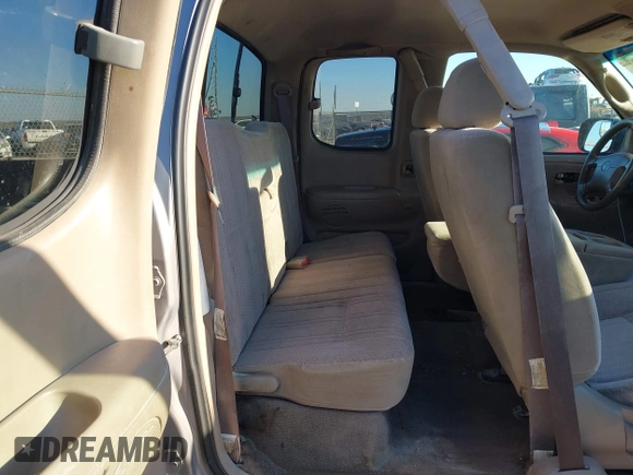 2000 Toyota Tundra SR5 with VIN 5TBRT3413YS019873, listed as a IAAI auction lot 41412497 with 305,472 mi miles and . Bid and sale history available at DreamBid. Image 8.
