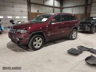 2018 Jeep Grand Cherokee Laredo E with VIN 1C4RJFAG9JC359284, listed as a IAAI auction lot 41032232 with 163,679 mi miles. Bid and sale history available at carsss.com. Image 2.