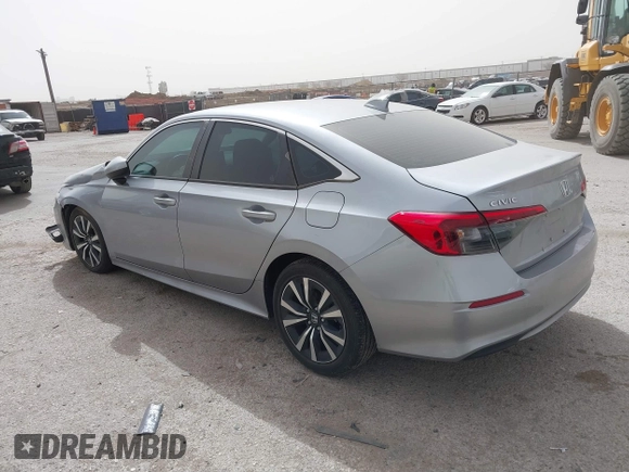 2023 Honda Civic EX with VIN 2HGFE1F77PH321210, listed as a IAAI auction lot 41797011 with 8,748 mi miles and . Bid and sale history available at DreamBid. Image 3.