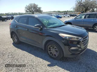2016 Hyundai Tucson Sport with VIN KM8J33A26GU161089, listed as a Copart auction lot 52941915 with 190,392 mi miles and Salvage Title. Bid and sale history available at carsss.com. Image 4.