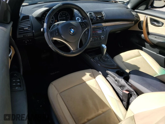 2011 BMW 1 Series 128i z VIN WBAUN1C58BVH83316, wystawiony jako Copart lot #52427935 z przebiegiem 89 781 mil mil oraz Szkoda całkowita • Salvage title. Historia ofert i sprzedaży dostępna na DreamBid. Obrazek 8.