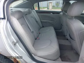 2009 Buick Lucerne CXL with VIN 1G4HD57M79U141033, listed as a IAAI auction lot 42061042 with 161,021 mi miles. Bid and sale history available at carsss.com. Image 8.
