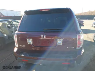 2007 Honda Pilot LX with VIN 2HKYF18167H510970, listed as a IAAI auction lot 40827681 with 119,011 mi miles. Bid and sale history available at carsss.com. Image 16.