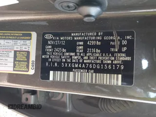 2013 Kia Optima LX with VIN 5XXGM4A76DG156179, listed as a IAAI auction lot 41829910 with 125,968 mi miles. Bid and sale history available at carsss.com. Image 9.