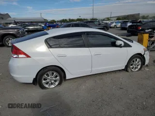 2010 Honda Insight EX z VIN JHMZE2H75AS007066, wystawiony jako Copart lot #54910995 z przebiegiem 107 658 mil mil oraz Szkoda całkowita • Salvage title. Historia ofert i sprzedaży dostępna na DreamBid. Obrazek 3.