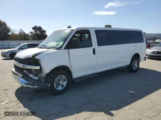 2019 Chevrolet Express Passenger LT with VIN 1GAZGPFG0K1196401, listed as a Copart auction lot 48614795 with 98,925 mi miles and Salvage Title. Bid and sale history available at carsss.com. Image 1.