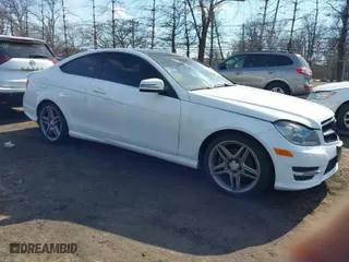 2014 Mercedes-Benz C-Class C 250 with VIN WDDGJ4HB6EG286448, listed as a IAAI auction lot 41668638 with 93,204 mi miles. Bid and sale history available at carsss.com. Image 1.