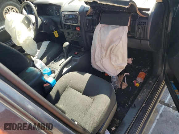 2004 Jeep Grand Cherokee Laredo with VIN 1J4GX48S74C195326, listed as a Copart auction lot 53993785 with 280,456 mi miles and Salvage title. Bid and sale history available at DreamBid. Image 8.